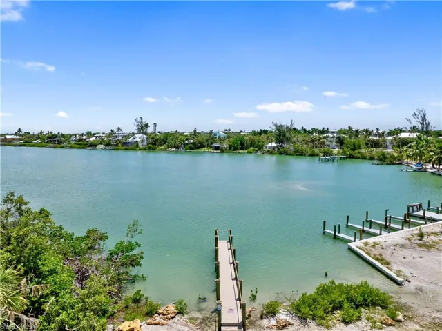 Property view of water featuring a dock