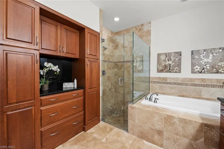 Master en-suite w/step-in shower, plenty of extra built-in storage