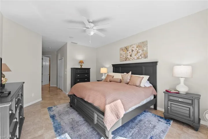 Master bedroom hallway leads to walk-in closest, en-suite back, living area