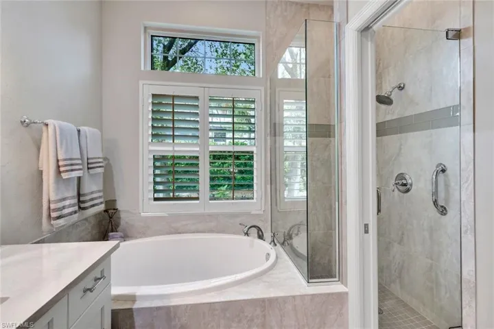 Master bathroom with soaking tub and walk in shower.