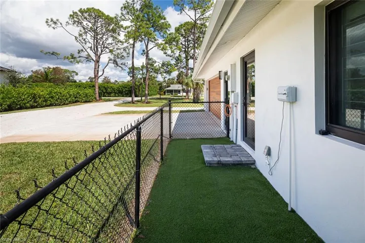 Pet relief station with artificial turf. Access door off the laundry/room