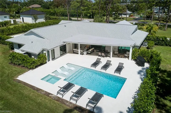 View of pool featuring a yard and a patio