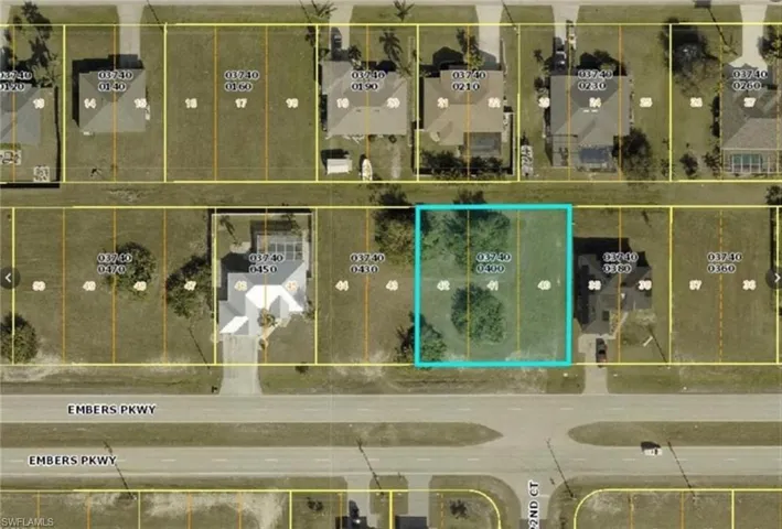 Aerial map of property and surrounding area featuring property boundaries highlighted
