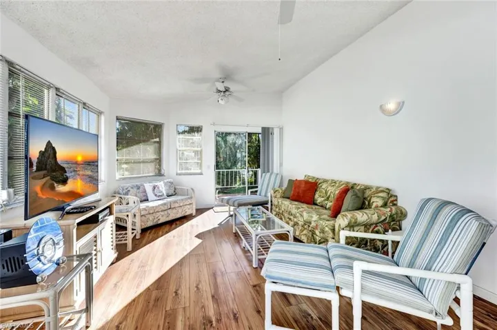 Sunroom with vaulted ceiling