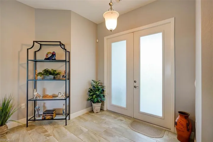Doorway featuring french doors