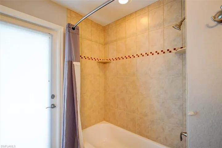 Bathroom featuring shower / tub combo
