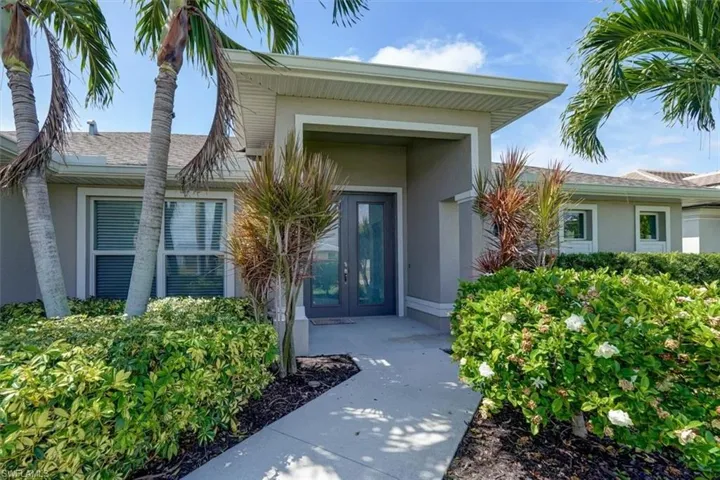 Property entrance with french doors
