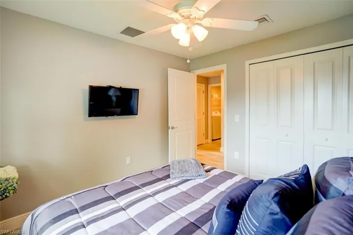 Bedroom featuring a closet and ceiling fan
