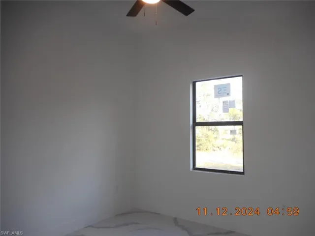 Spare room featuring ceiling fan
