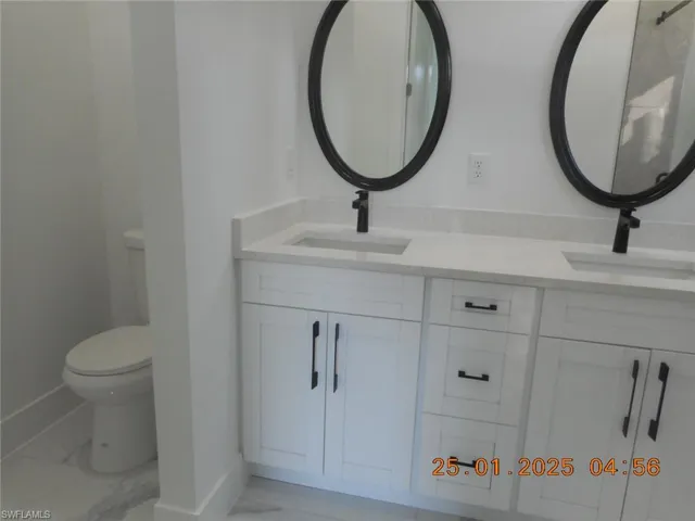 Master Bathroom with vanity and toilet