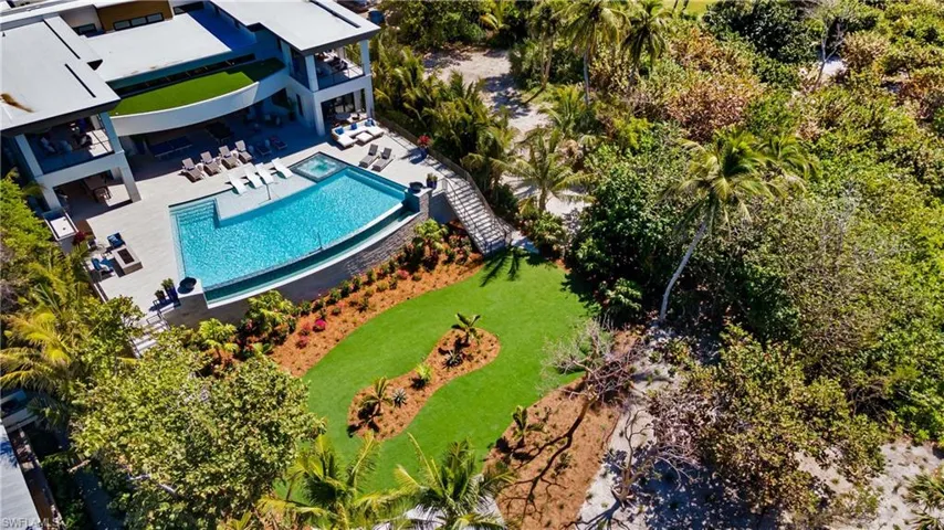 Over an acre of land, direct beach front property