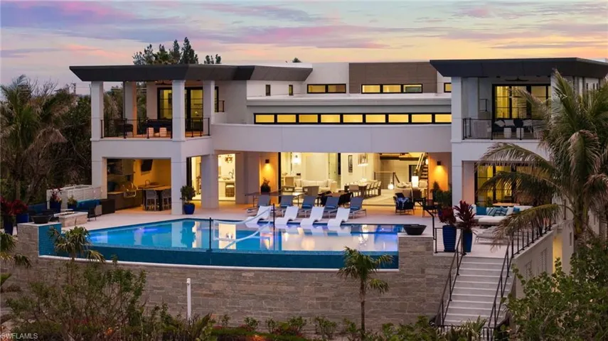 Elevated infinity edge pool extends the home to the outdoors