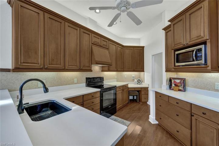 Large Kitchen Sink, Extra Cabinetry for Storage and Walk IN Pantry (not shown)