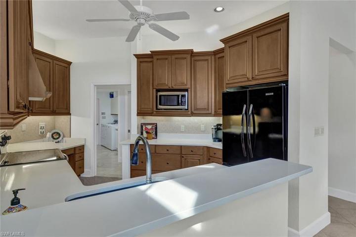 Real Wood Cabinetry, Newer Counter Tops, Fresh Paint