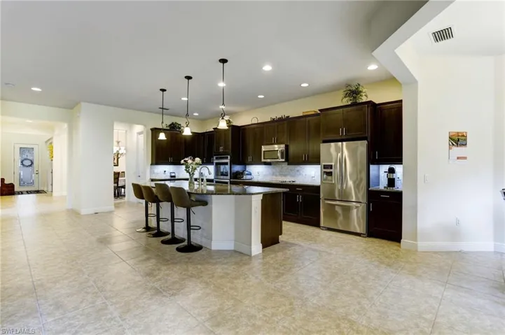 Eat In Kitchen with island seating and large breakfast nook