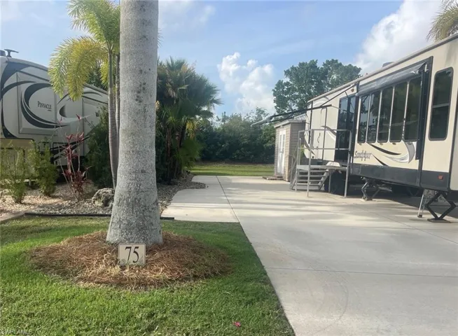 View of yard with a patio