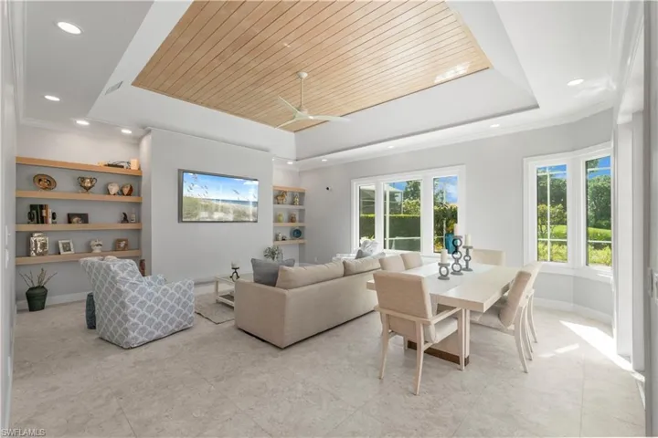 High Tray Ceiling with lovely wood detail.