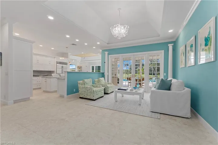 Stunningly renovated home with oversized porcelain tiles throughout and newly painted walls and trim.