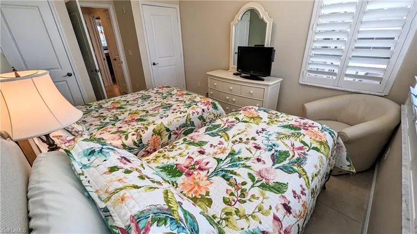 Guest bedroom with a twin bed and a full bed