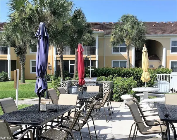 View of patio with outdoor dining area