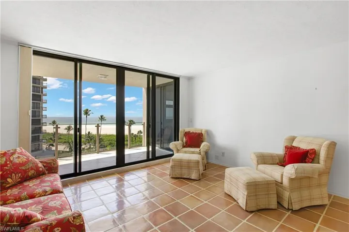 Sitting area in living room with beach view