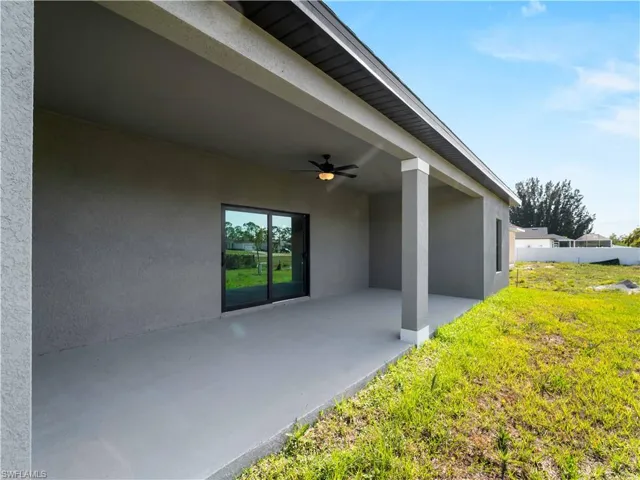 View of patio featuring ceiling fan