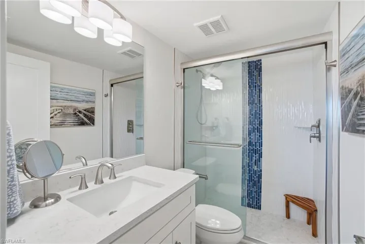 Shower includes a lower faucet to rinse sandy toes