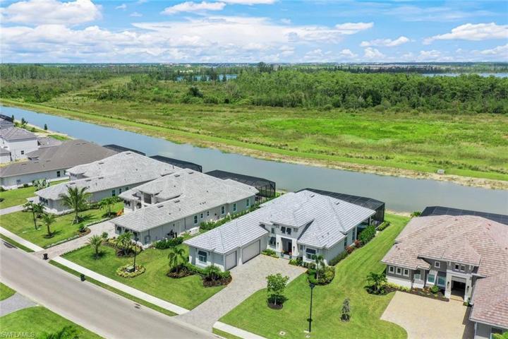 Aerial view of home and preserve beyond. SO much privacy!