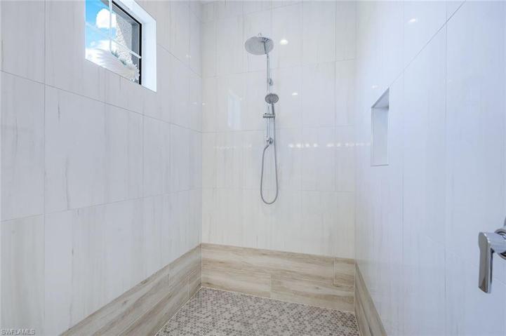 Transom window allows for so much light in the bathroom.