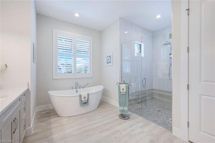 Custom tile in primary bathroom.
