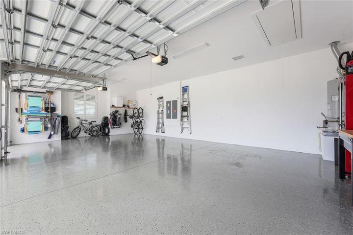 HUGE 3 car garage with epoxy finished garage floor.