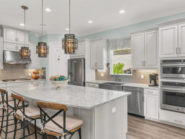Featuring a 10' quartz island filled w/ under counter cabinets for additional storage