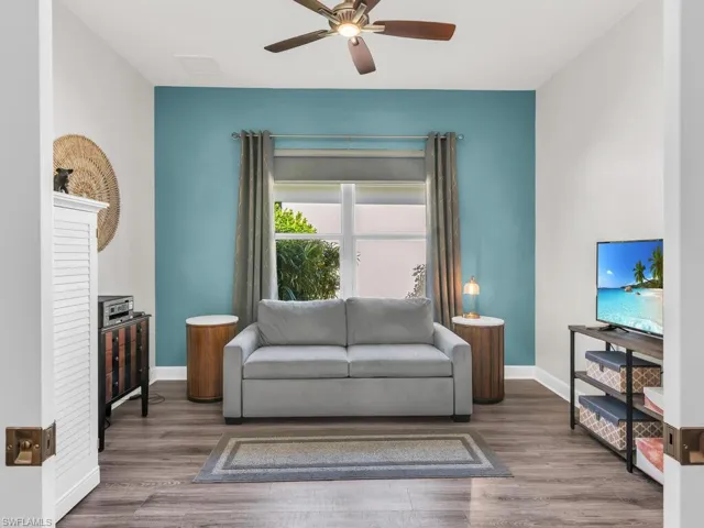 Double pocket doors with bright natural light from double window