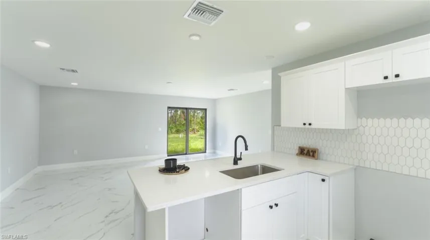 625  Flamingo  AVE, Lehigh Acres, FL 33974