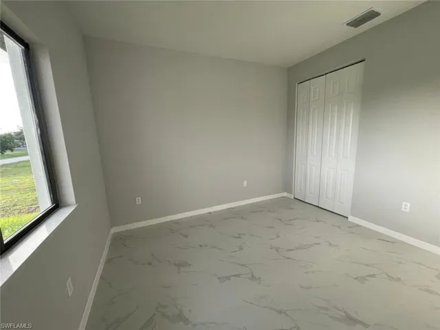 View of tiled empty room