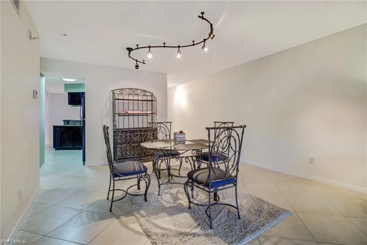 124 Cypress Way E E5, Naples, Florida 34110