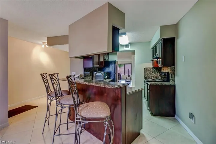 124 Cypress Way E E5, Naples, Florida 34110
