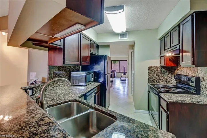 124 Cypress Way E E5, Naples, Florida 34110