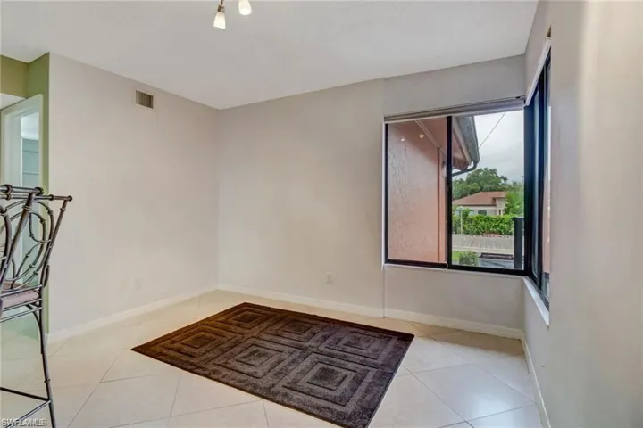 124 Cypress Way E E5, Naples, Florida 34110