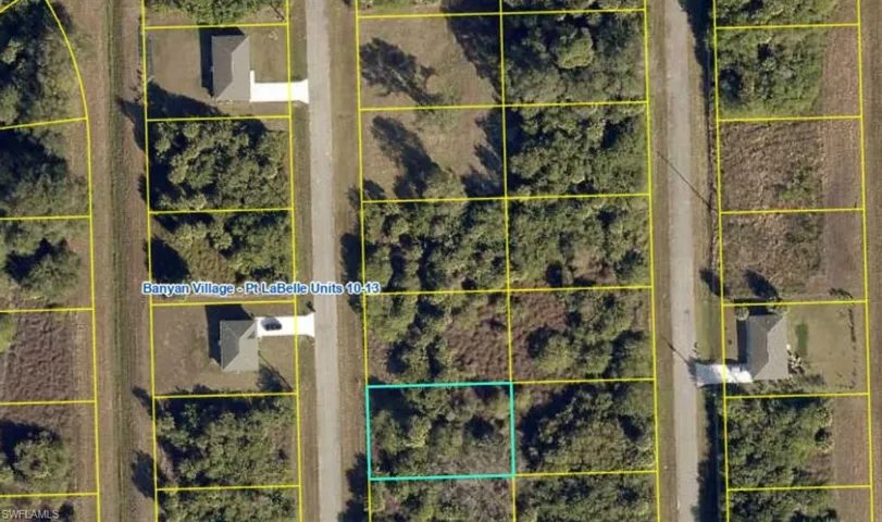 Aerial map of property and surrounding area featuring property boundaries highlighted