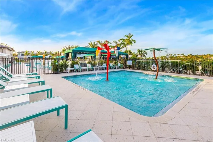 View of swimming pool featuring a patio area and pool water feature