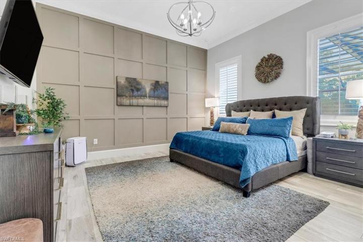 Primary bedroom with custom woodwork