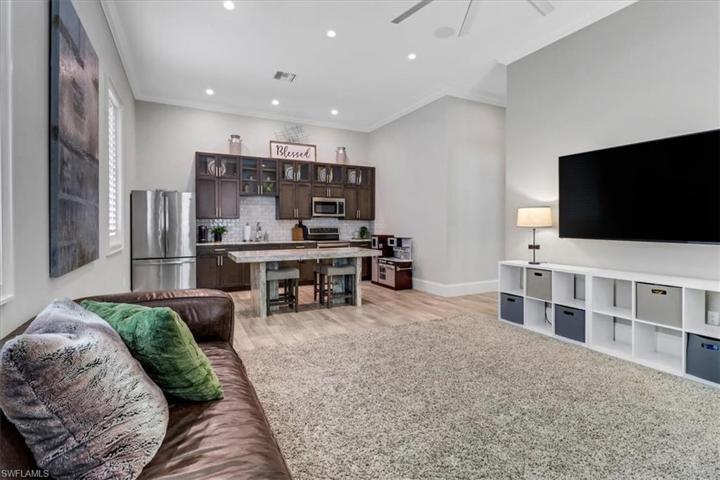 Separate entertaining space with large living room area and full kitchen!