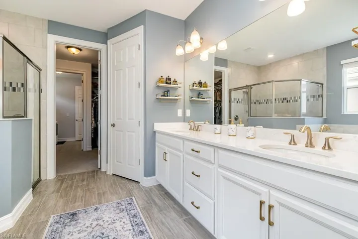 Bathroom with vanity and walk in shower