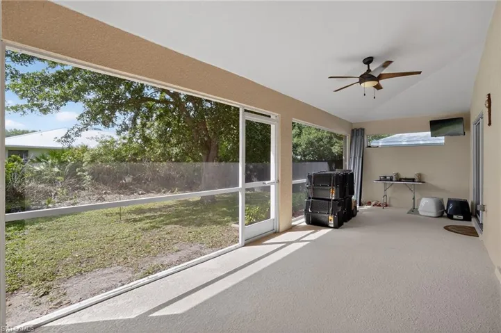 Under truss lanai. Dining room view.