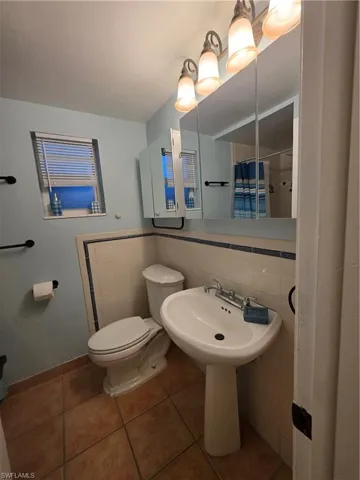 Main back bathroom with double mirrored medicine cabinets