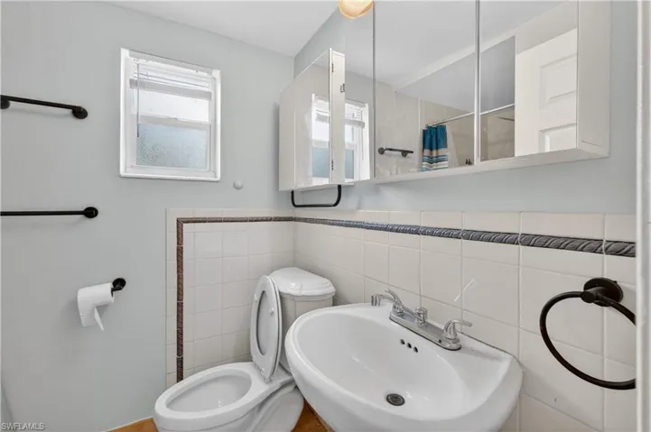 Main back bathroom with double mirrored