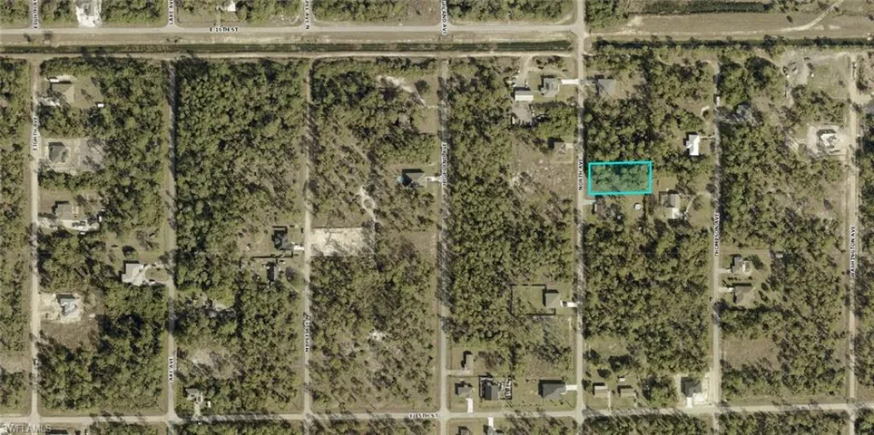 Aerial overview of property's location featuring property boundaries highlighted