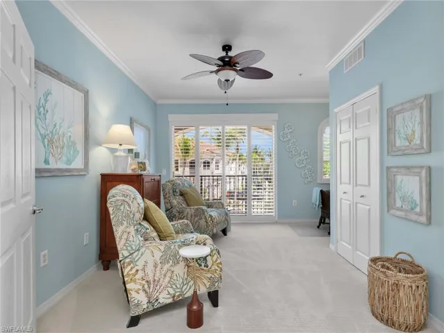 3rd Bedroom with French Doors, Crown Molding, Ceiling Fan, & Floor to Ceiling Windows &  1 Arched Window both with with Plantation Shutters