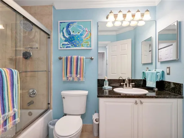 Second Bathroom with Granite Vanity Top, Tiled Tub/Shower Combo with Rain Showerhead, & Medicine Cabinet